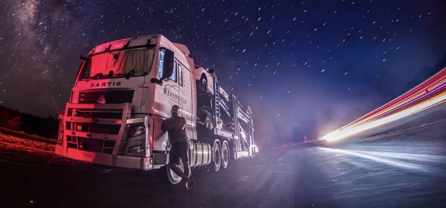 Auto Mover Heavy Truck Transport Under Starlit Sky