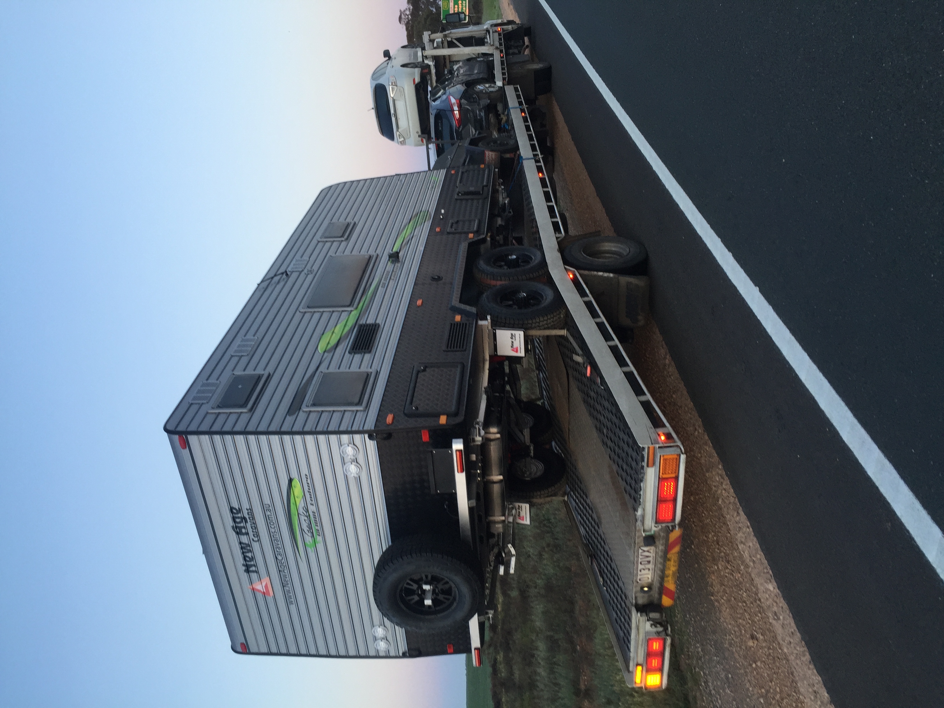 Auto Mover Transporting New Age Caravan on Flatbed