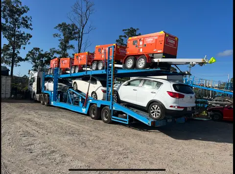 Auto Mover Car Carrier Transporting Multiple Vehicles Interstate
