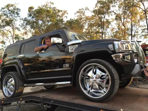Auto Mover Black Hummer H2 on Transport Carrier