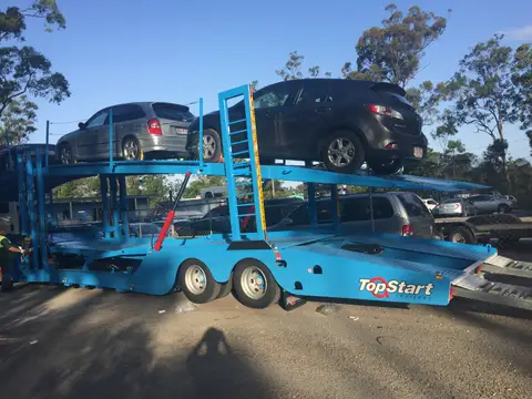 Auto Mover Car Carrier Loaded with Two Vehicles