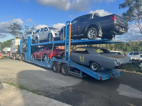 Auto Mover Car Carrier Transporting Multiple Vehicles