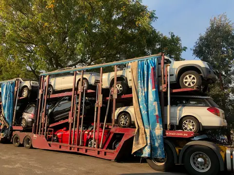 Auto Mover Car Carrier Transporting Multiple Vehicles Interstate