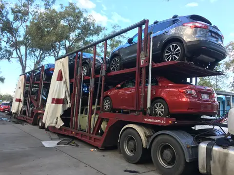 Auto Mover Car Carrier Transporting Multiple Vehicles Interstate