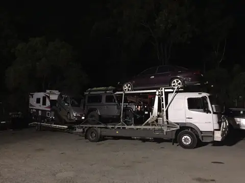Auto Mover Car Carrier Transporting Multiple Vehicles Overnight