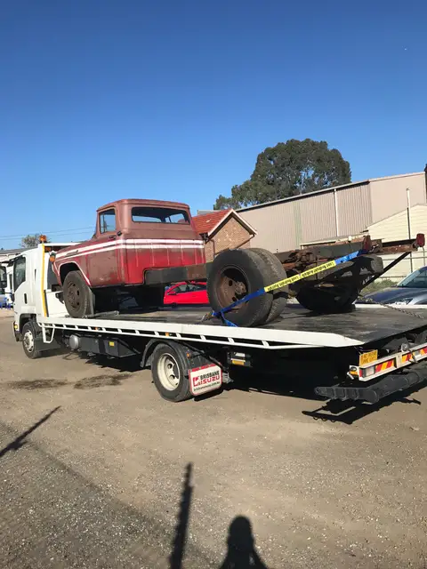 Auto Mover Classic Red Truck Loaded on Flatbed Carrier