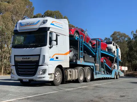 Auto Mover DAF truck transporting multiple vehicles
