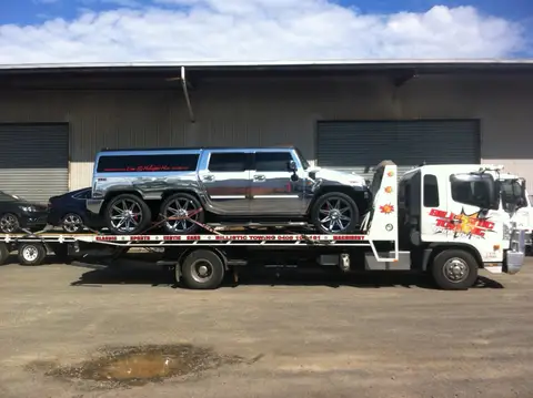 Auto Mover Hummer Limousine on Interstate Car Carrier