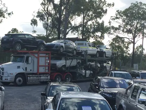Auto Mover Loading Mixed Vehicle Fleet onto Carrier