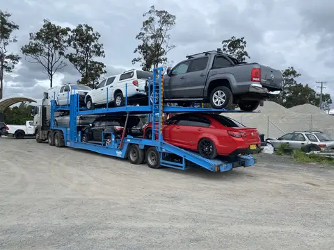 Auto Mover Multi-Deck Car Carrier Transporting Four Vehicles