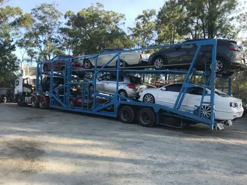 Auto Mover Multi-Level Car Carrier Transporting Six Vehicles