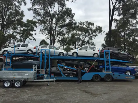 Auto Mover Multi-Level Car Carrier with Multiple Vehicles Loaded