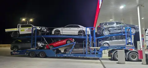 Auto Mover Multi-Vehicle Transport Carrier at Night Loading