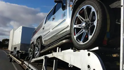 Auto Mover White Pickup Truck on Transport Trailer