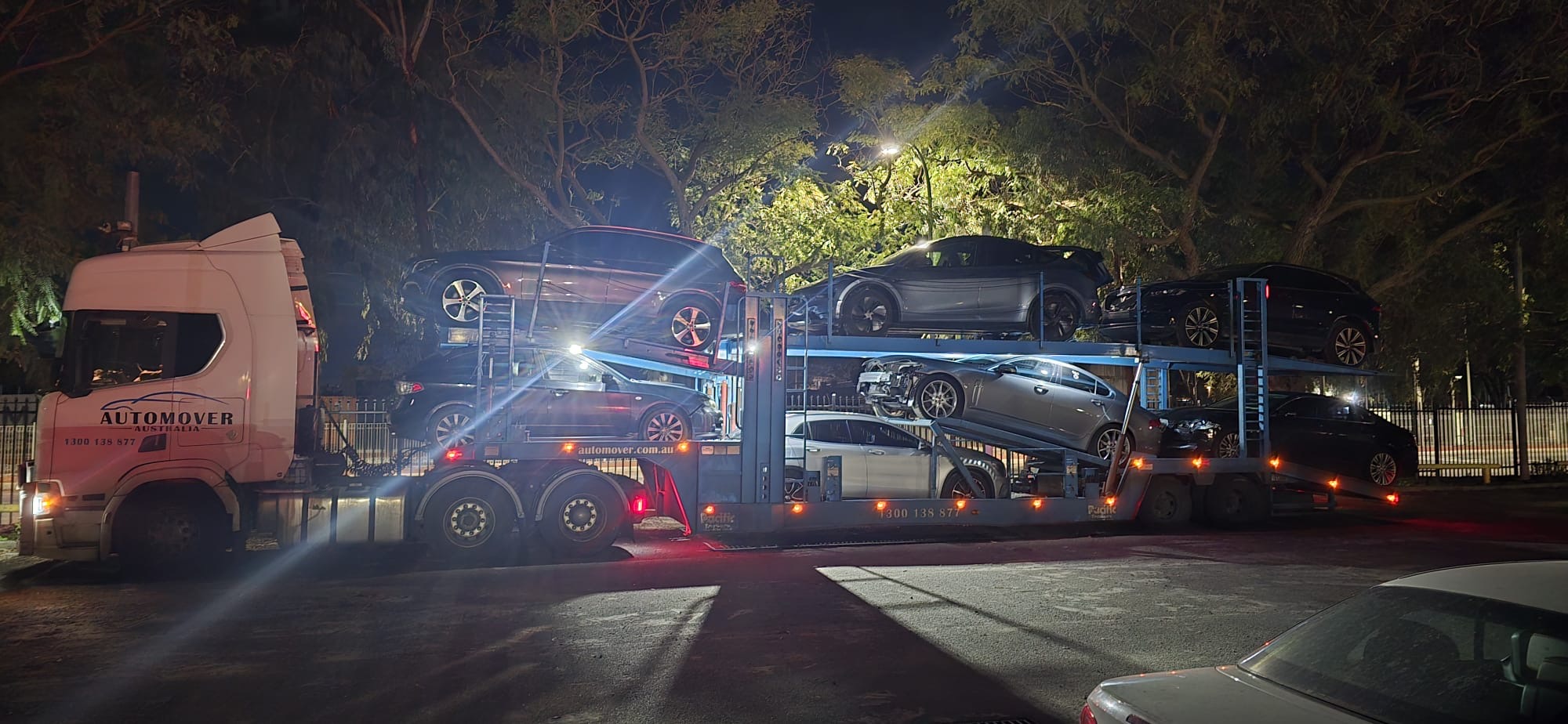Car Carrier Truck Loaded at Night