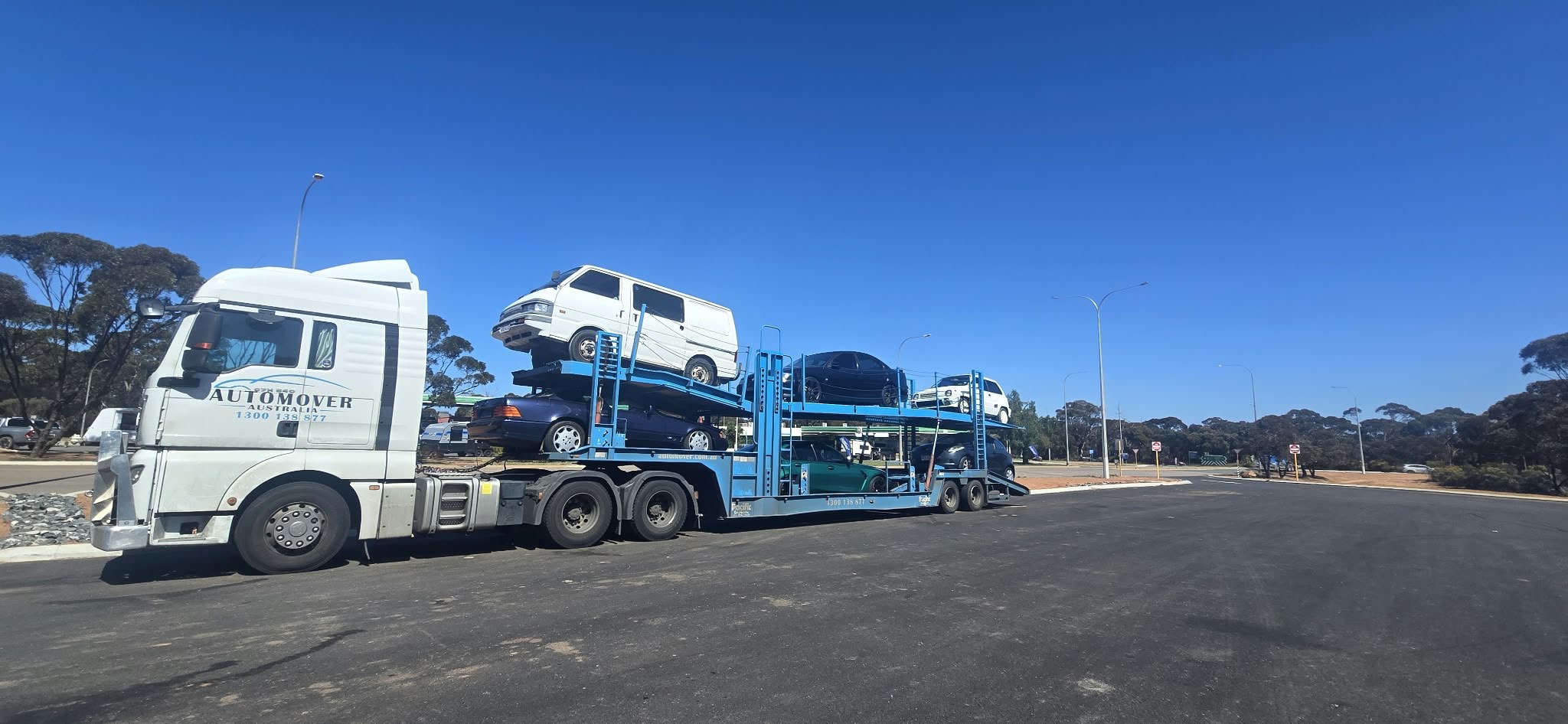 Auto Mover Car Carrier Truck Transporting Multiple Vehicles Interstate