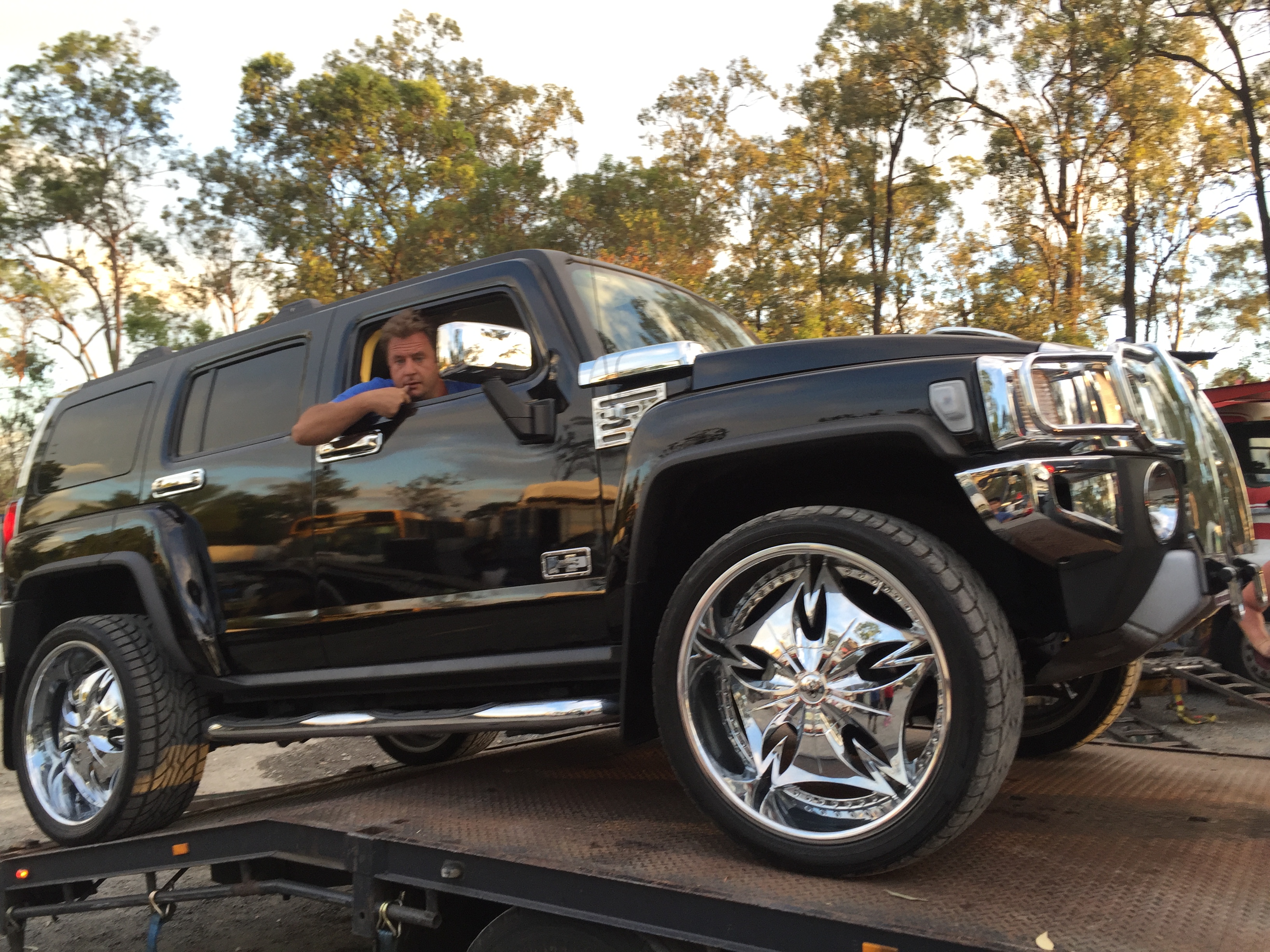 Auto Mover Black Hummer H2 on Transport Carrier