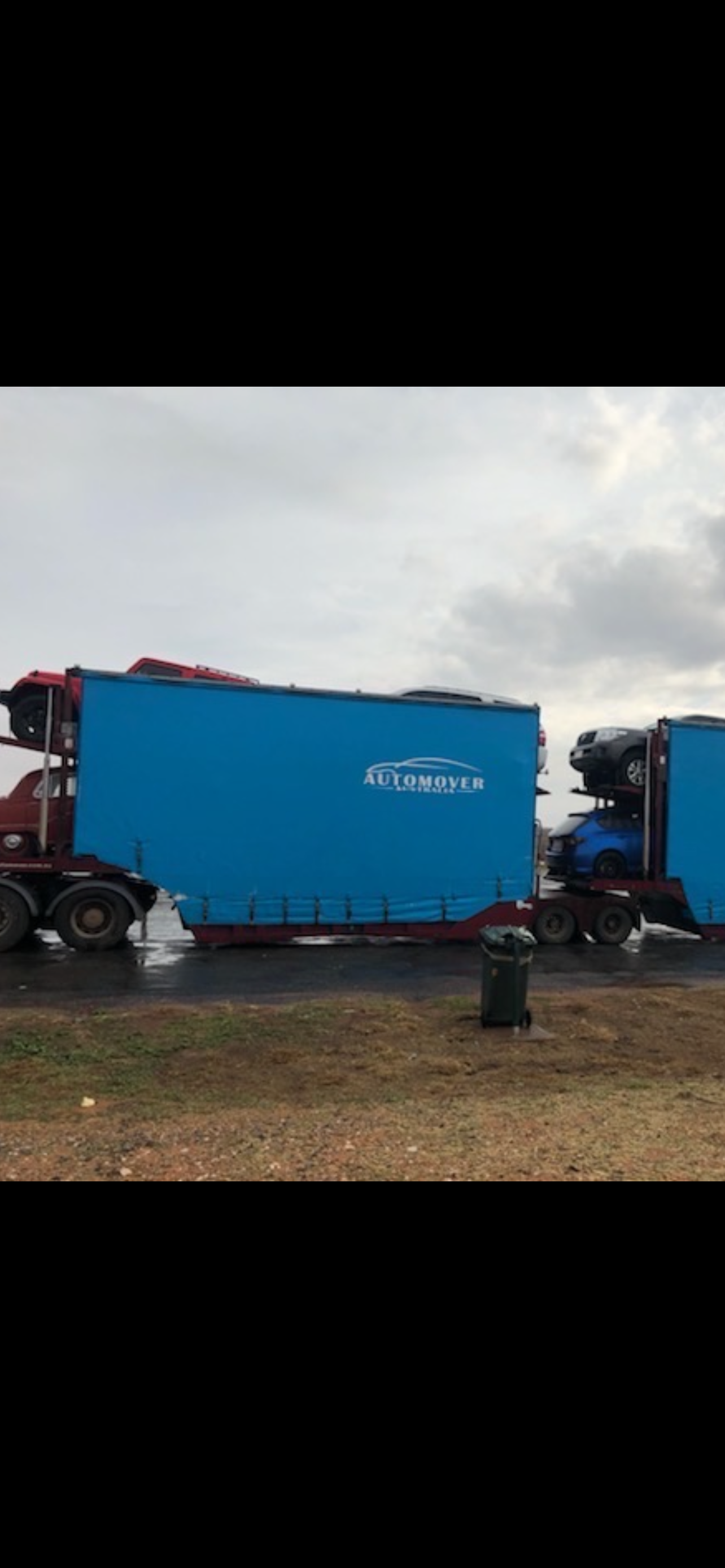 Auto Mover Blue Enclosed Car Transport Carrier Fleet
