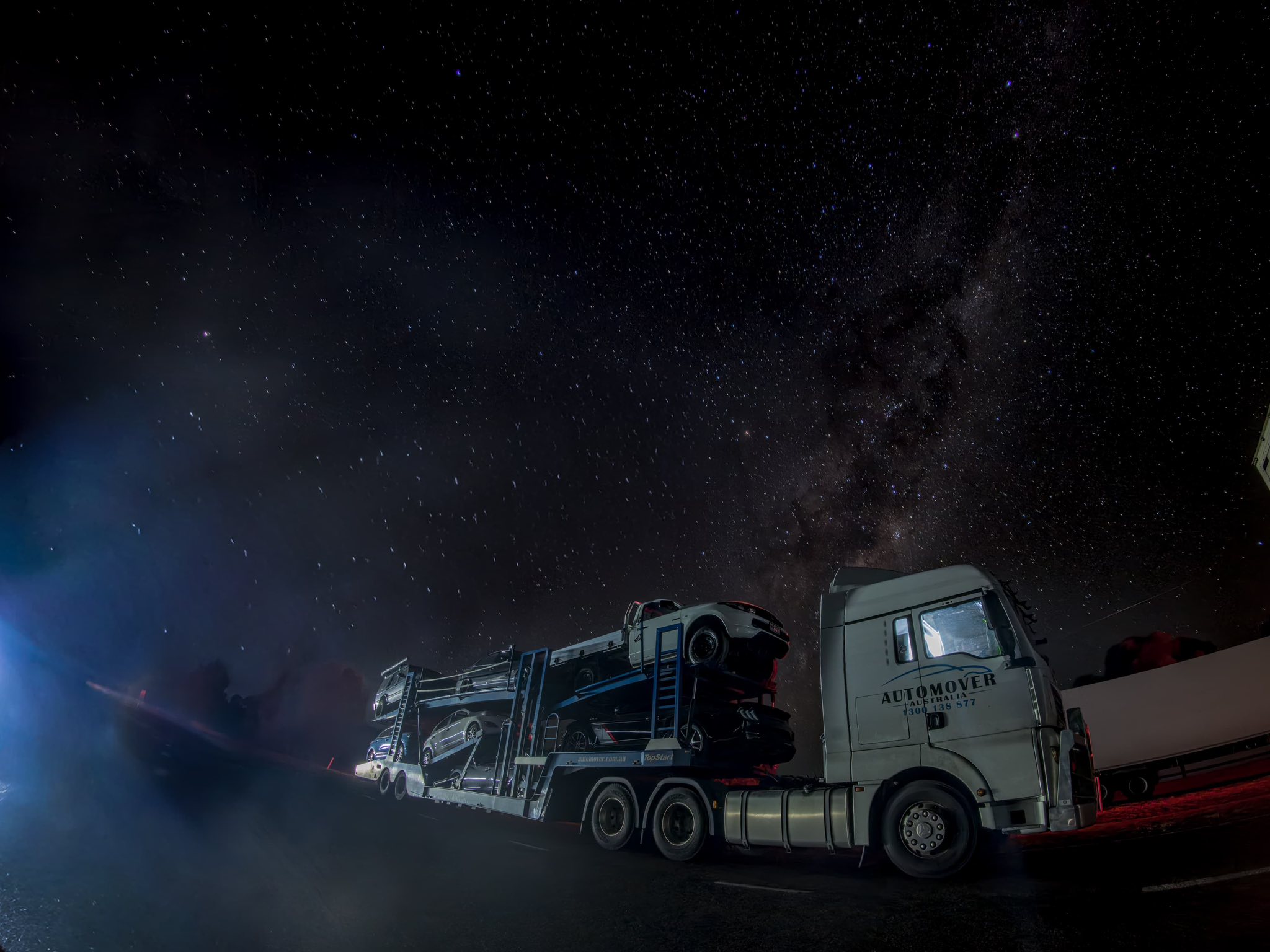 Auto Mover Car Carrier at Night with Starry Sky