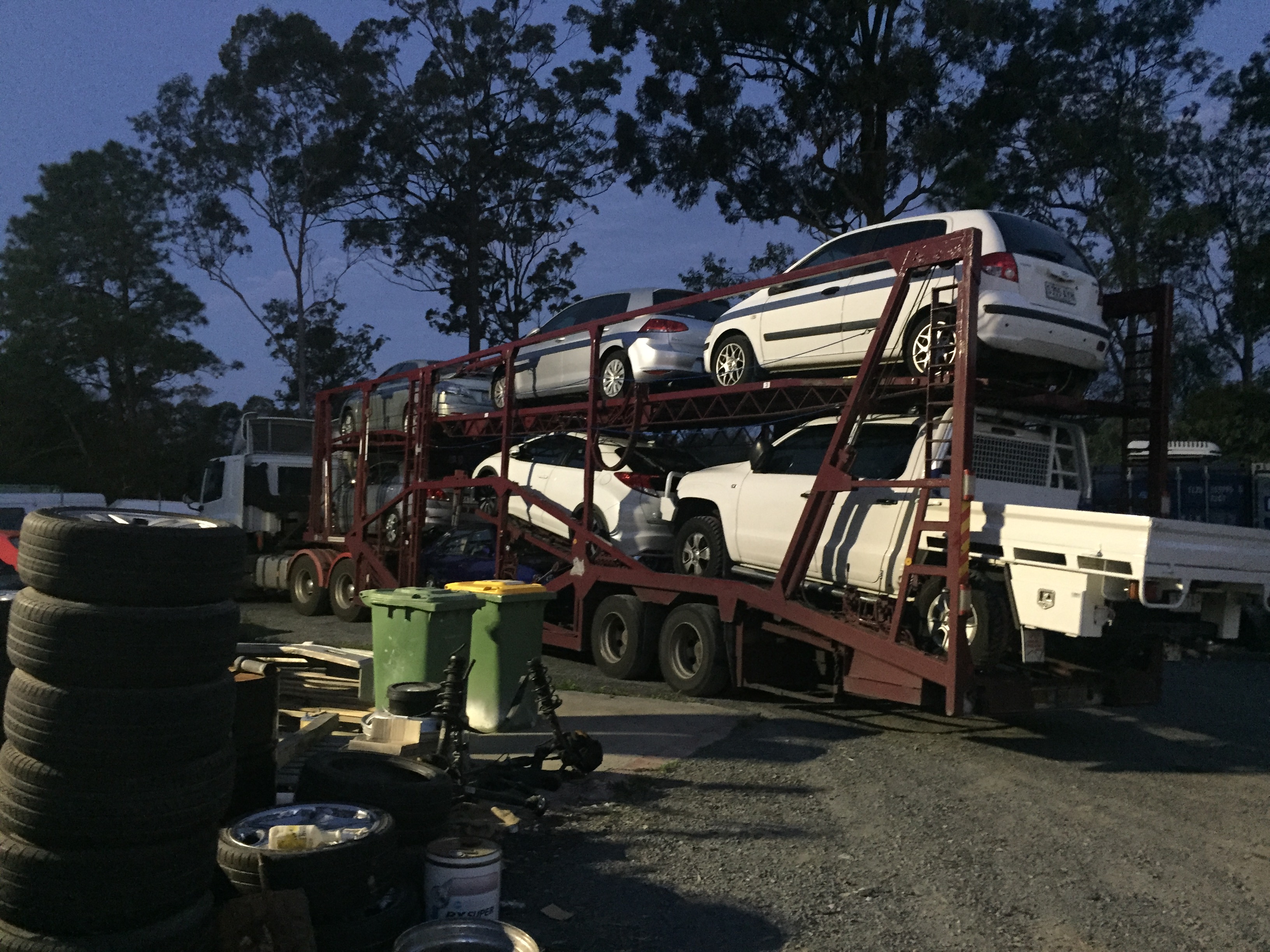 Auto Mover Car Carrier Loaded with Multiple White Vehicles