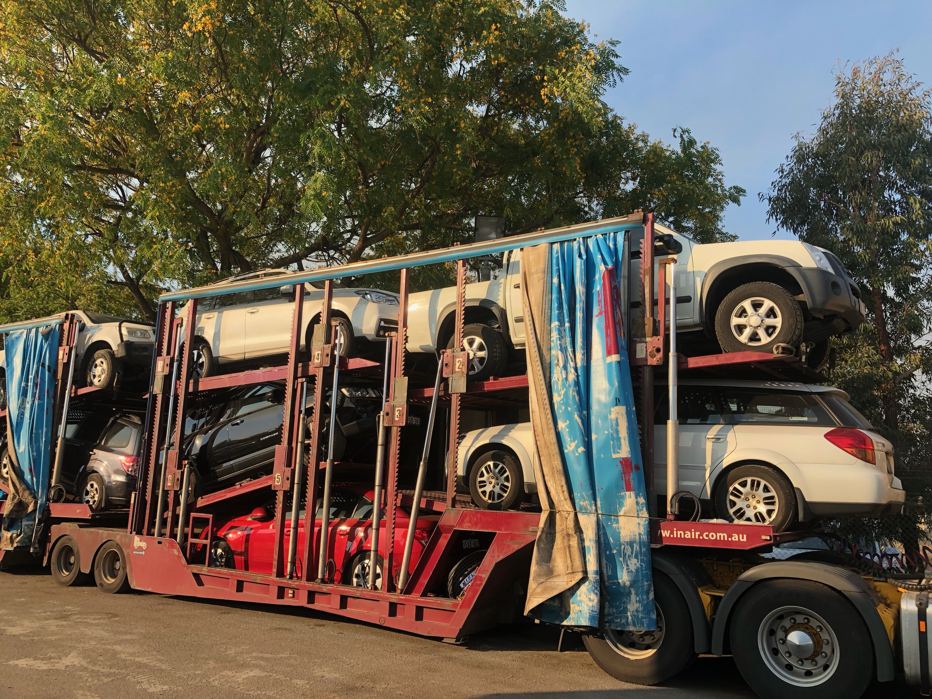 Auto Mover Car Carrier Transporting Multiple Vehicles Interstate