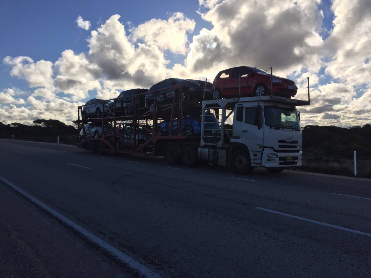 Auto Mover Car Carrier Transporting Multiple Vehicles Interstate
