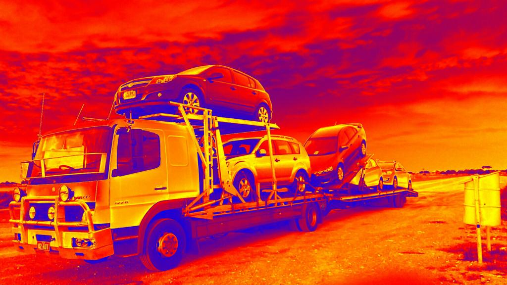 Auto Mover Car Carrier Transporting Multiple Vehicles Interstate