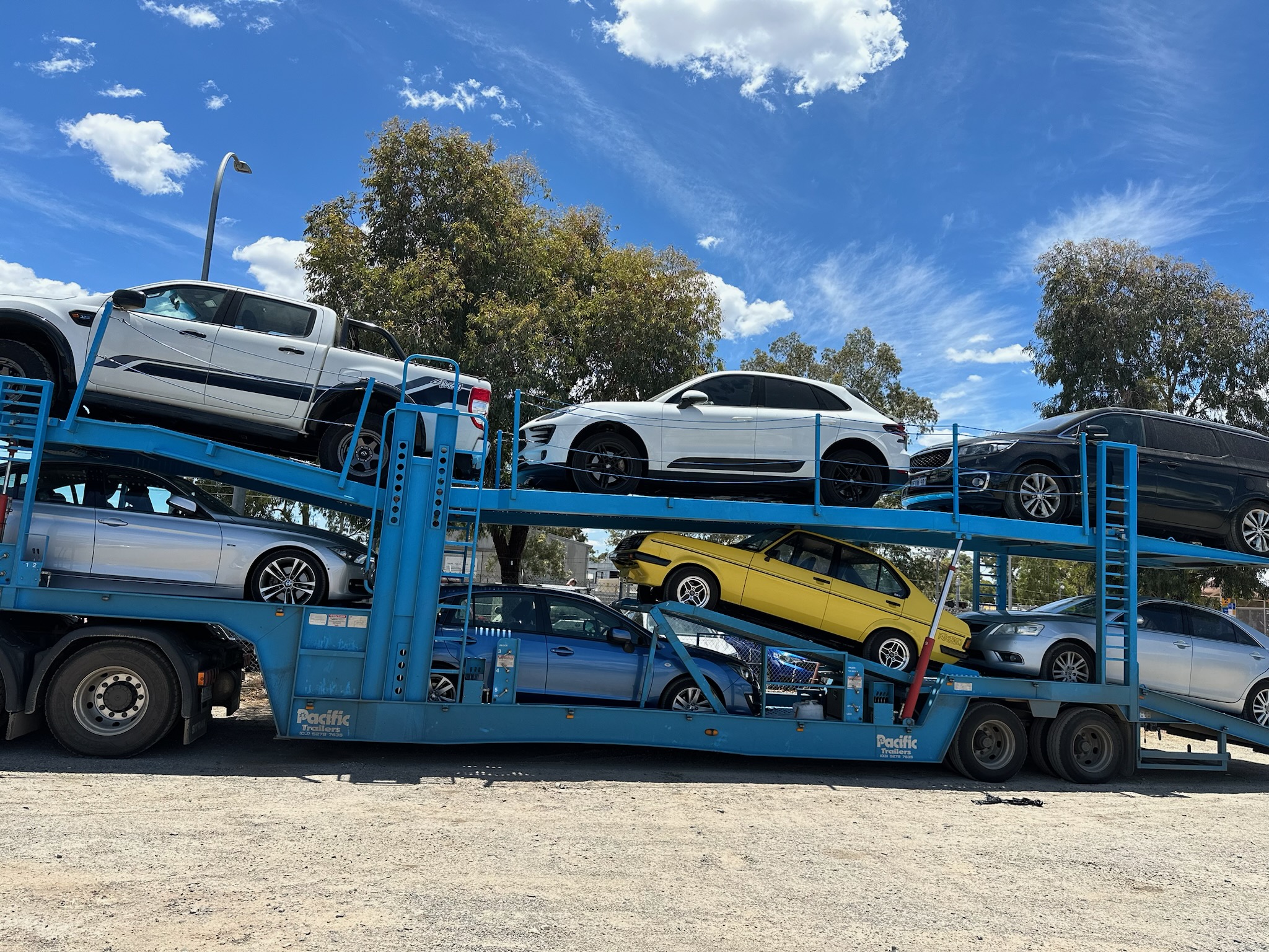 Auto Mover Car Carrier Transporting Multiple Vehicles Interstate