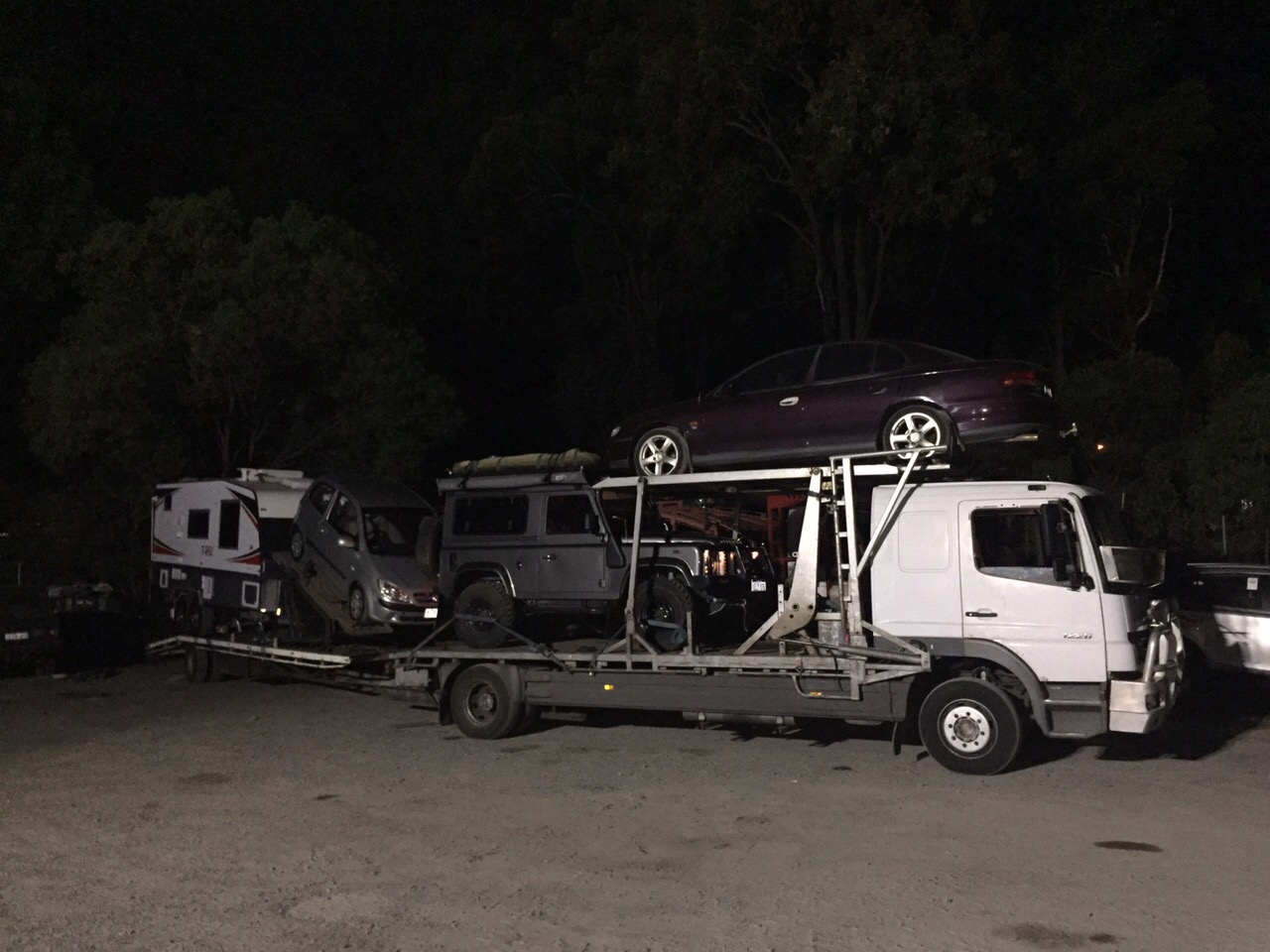 Auto Mover Car Carrier Transporting Multiple Vehicles Overnight