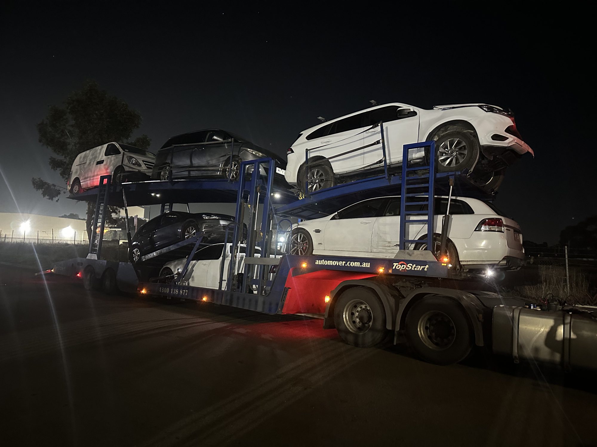 Auto Mover Car Carrier Transporting Multiple Vehicles Overnight