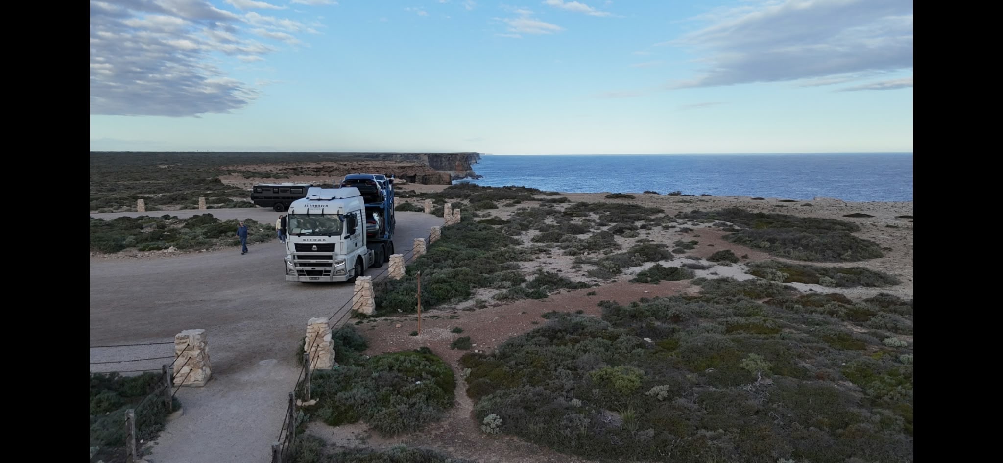 Auto Mover truck transport – Car Carrier Truck Parked Near Coastal Cliffs