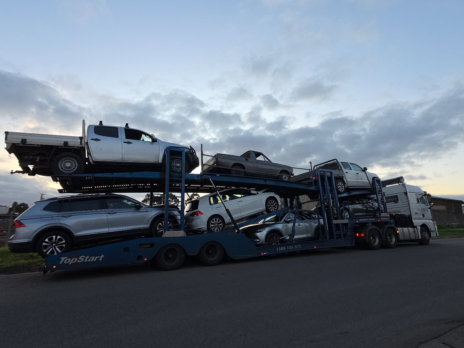 Fully Loaded Car Carrier at Dusk