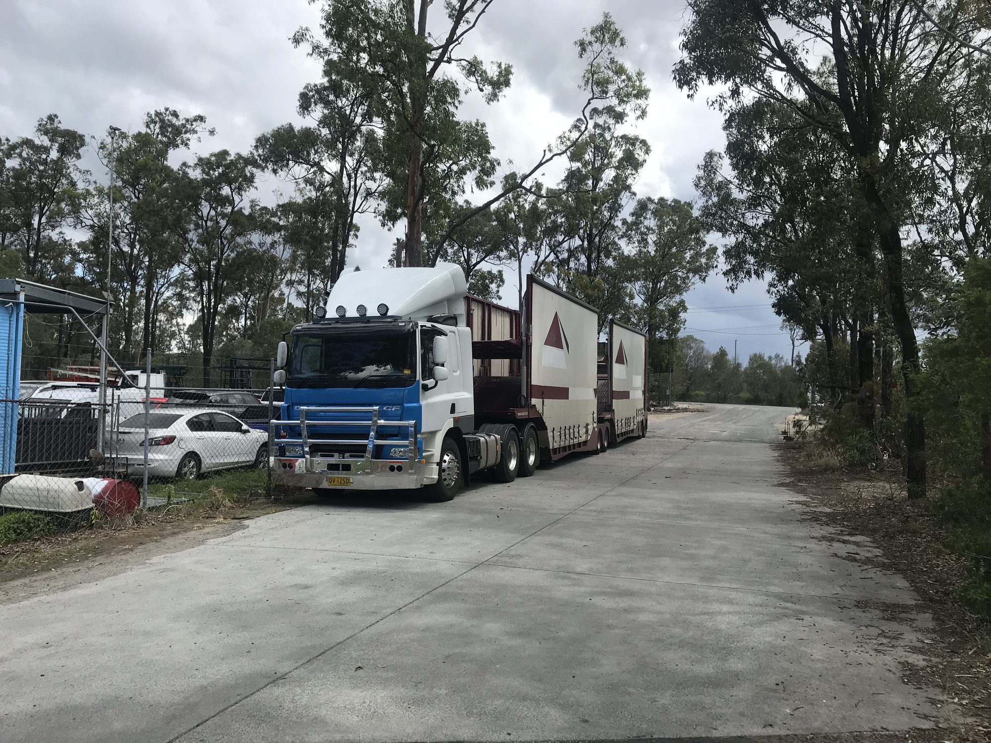 Auto Mover Livestock Transport Truck at Facility