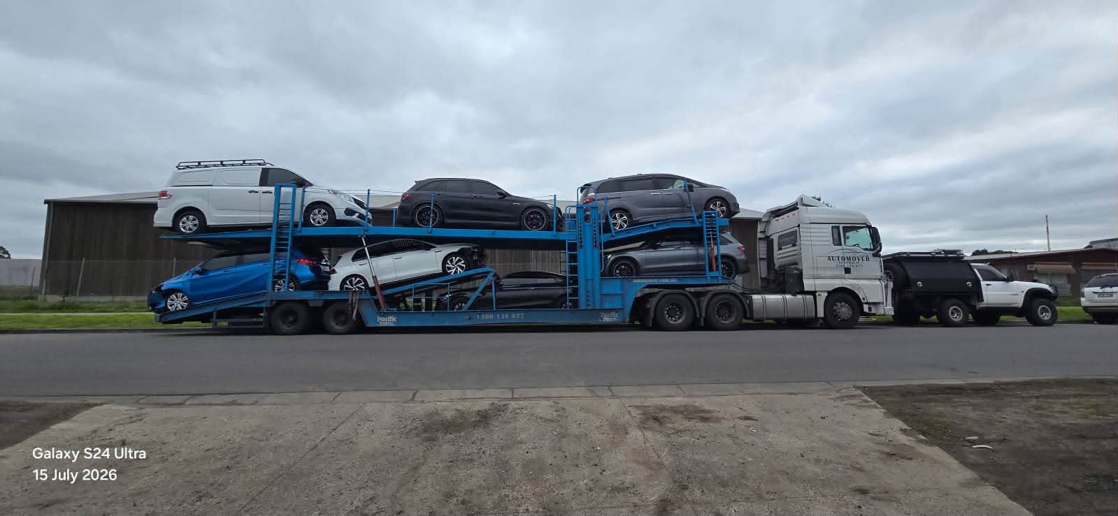 Auto Mover Multi-Deck Car Carrier Transporting Five Vehicles