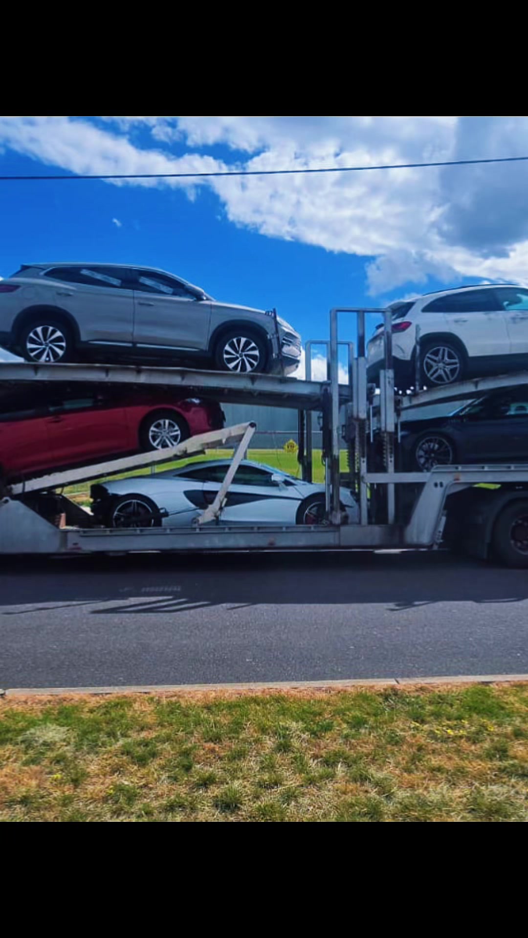 Auto Mover Multi-Level Car Carrier with Five Vehicles Loaded