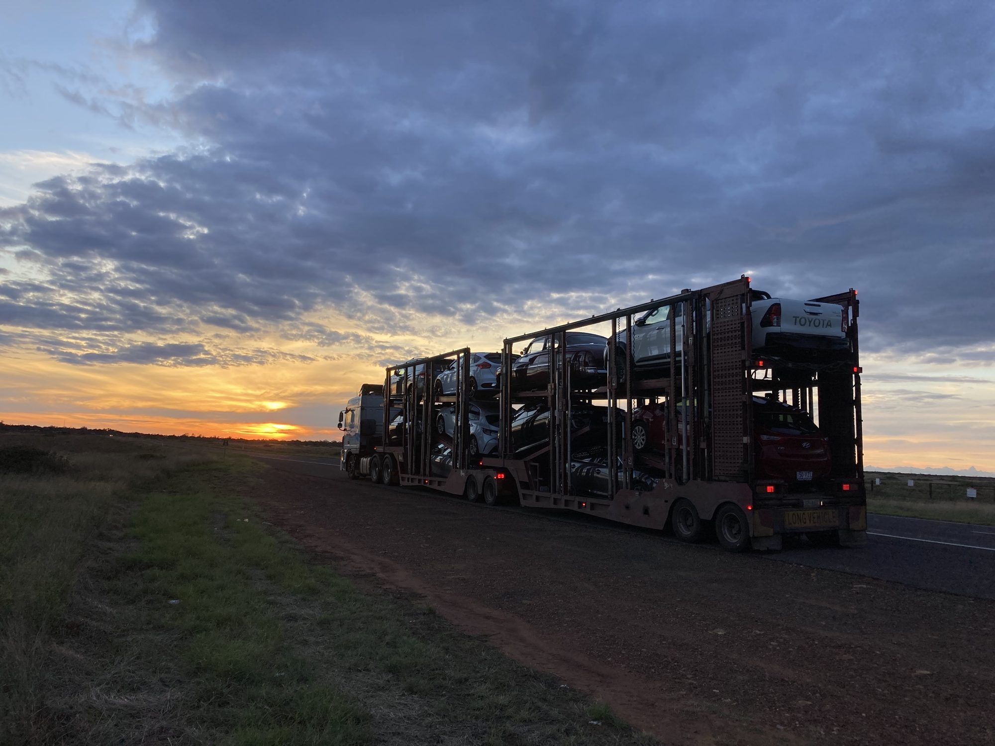 Auto Mover Multi-Vehicle Car Carrier at Sunset