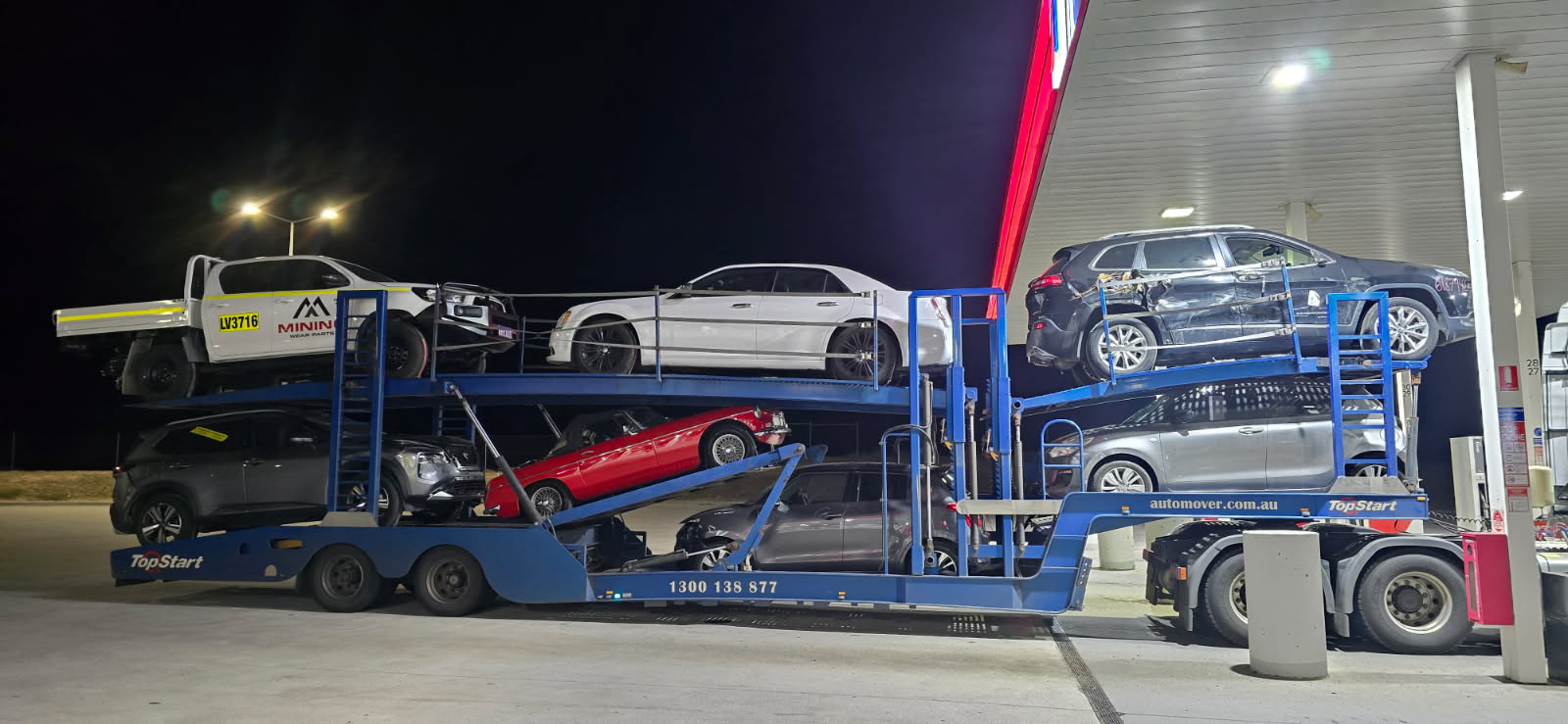 Auto Mover Multi-Vehicle Transport Carrier at Night Loading