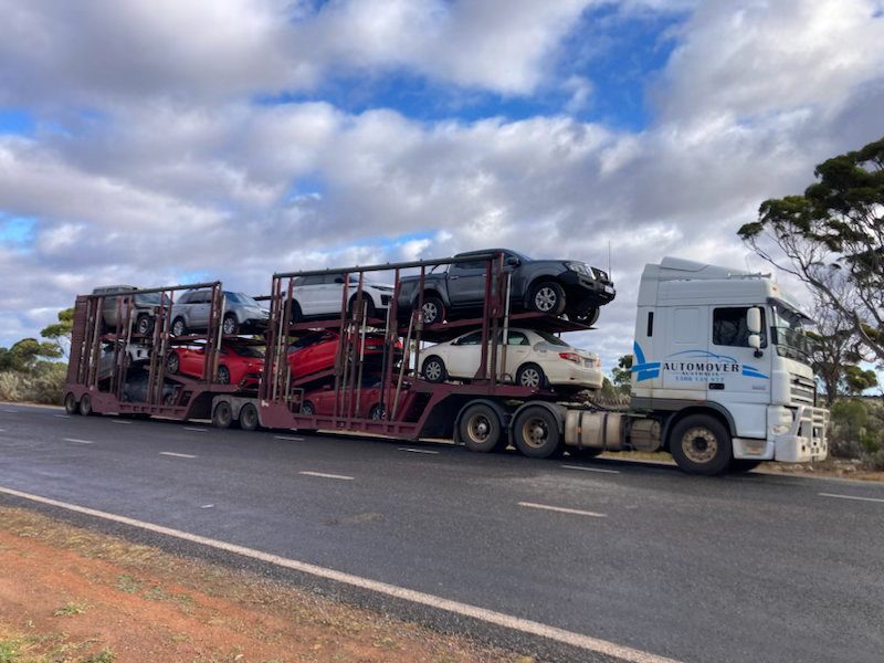 Auto Mover Multi-Vehicle Transport Carrier on Highway