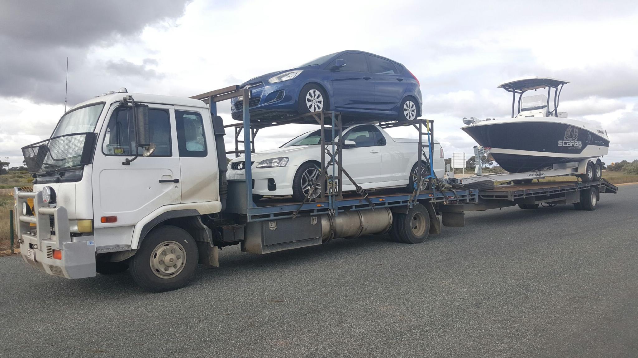 Auto Mover Multi-Vehicle Transport with Cars and Boat