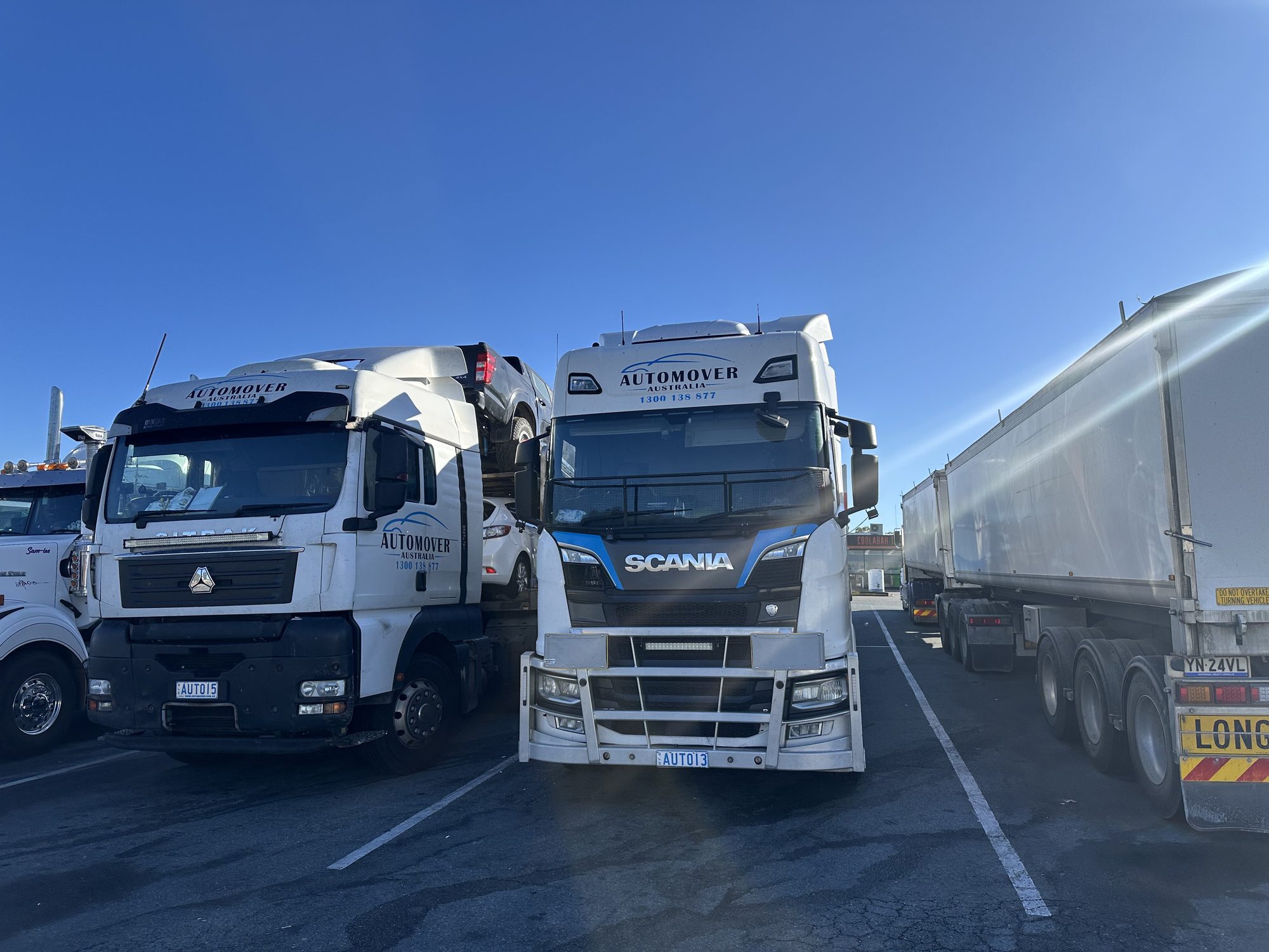 Auto Mover Scania truck carrying vehicles on highway
