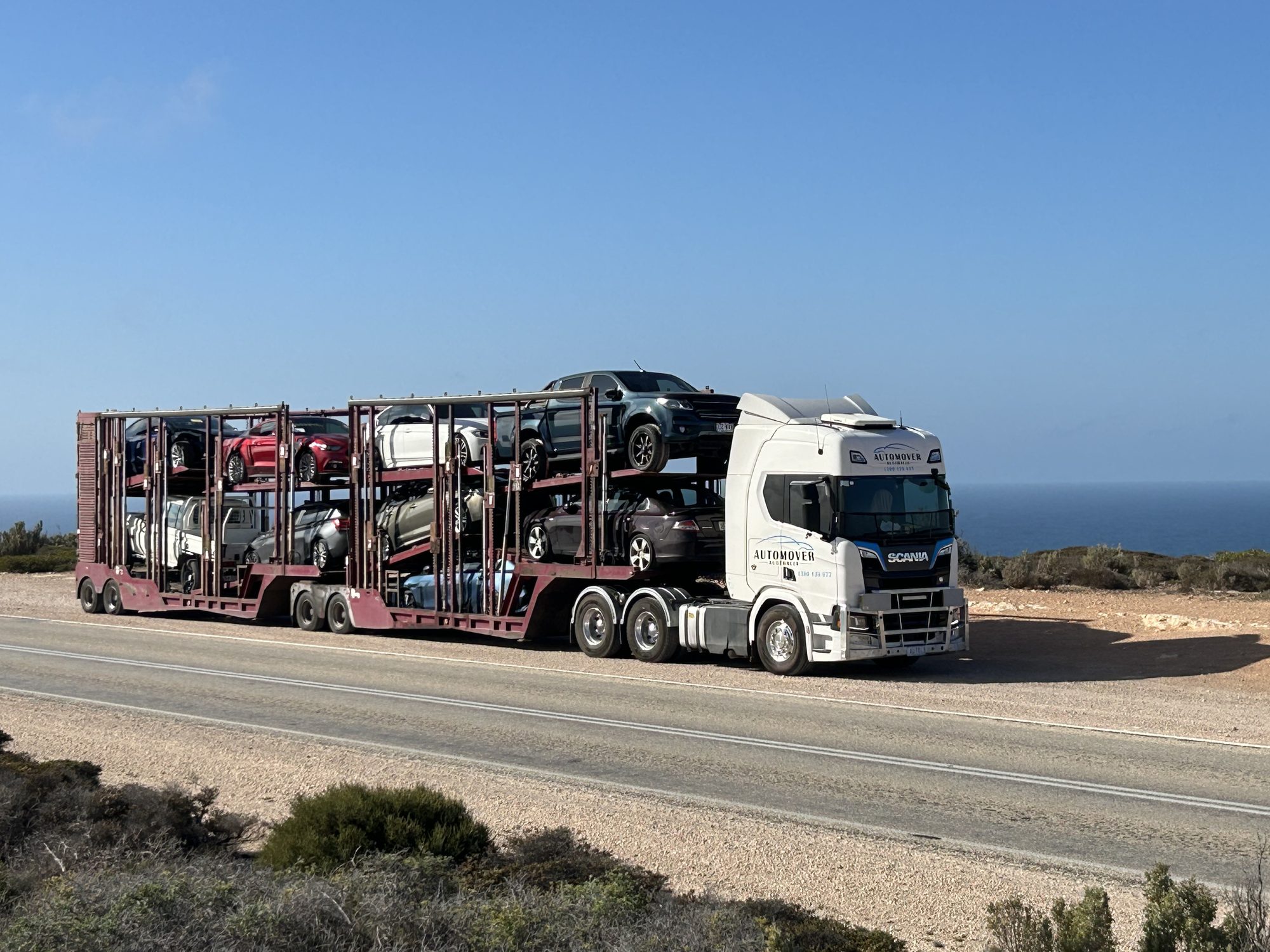 Auto Mover Scania Truck Transporting Multiple Vehicles Interstate