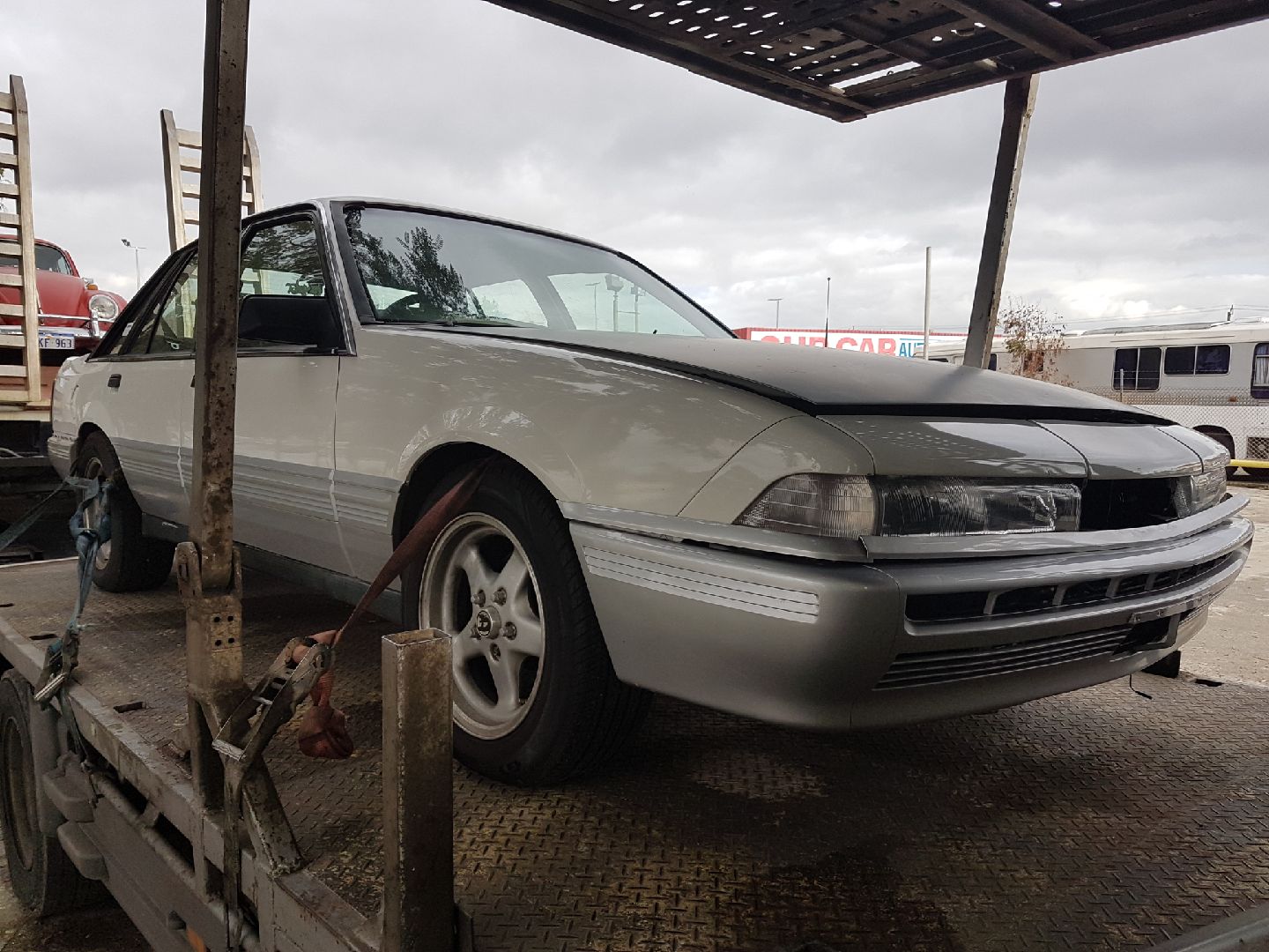 Auto Mover Silver Sedan Prepared for Interstate Transport