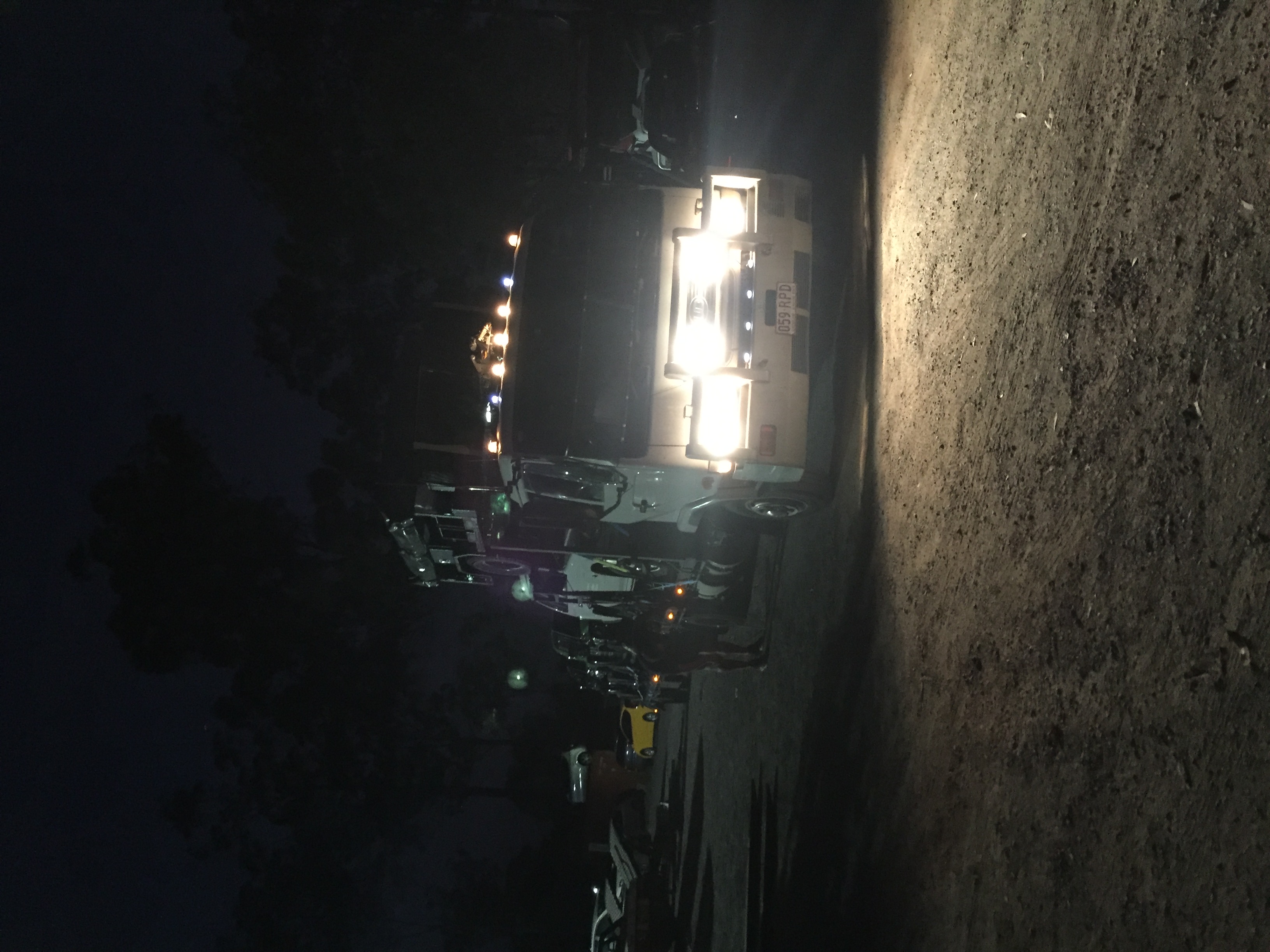 Auto Mover Truck Loading Vehicles at Night