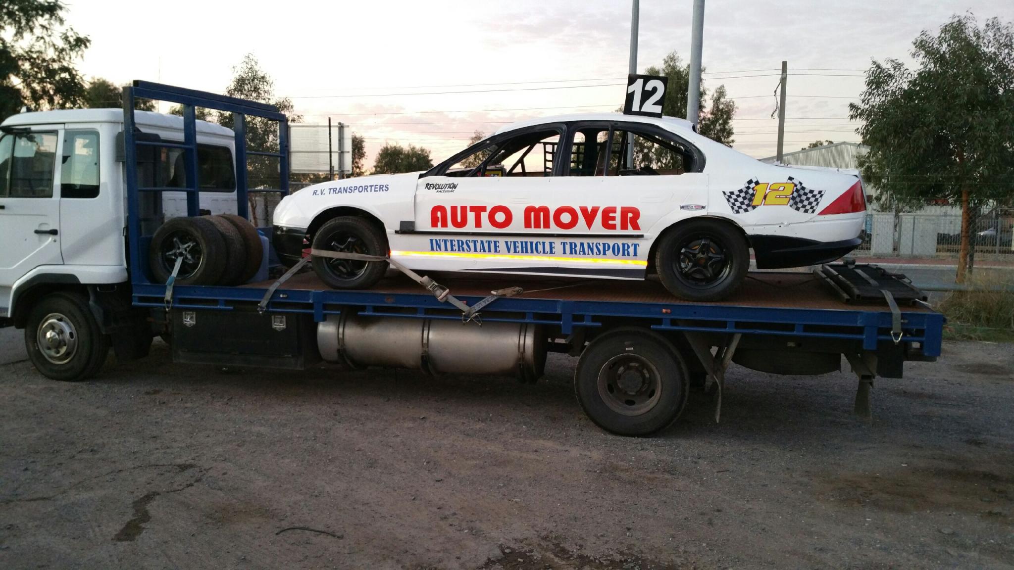 Auto Mover White Racing Sedan Interstate Transport